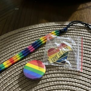 LGBTQ+ pride bracelets and pins
